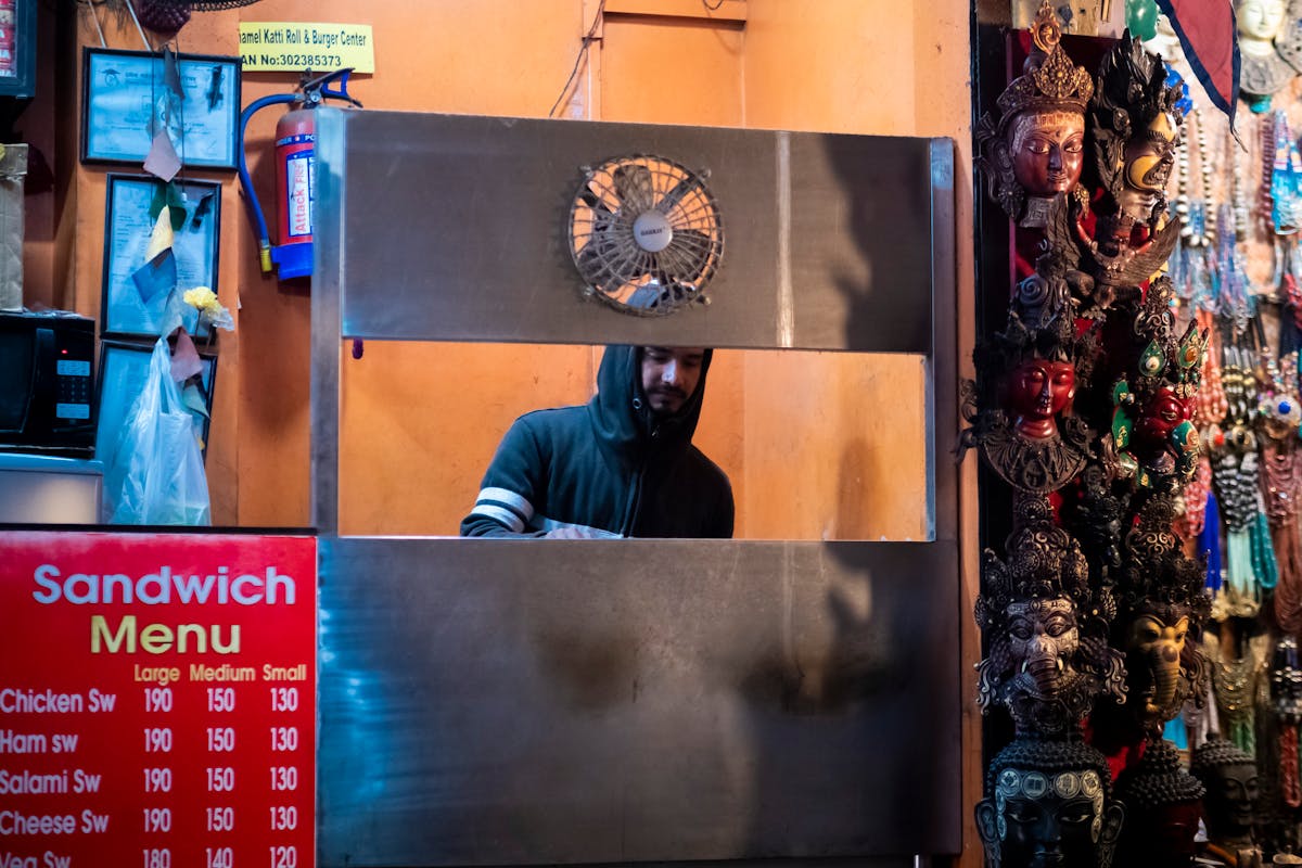 Soft scrambled eggs being cooked gently in a pan