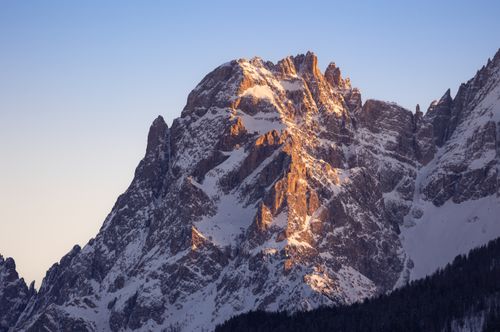 Free Stunning view of the Dolomite mountains during a winter sunset, capturing vivid colors and textures. Stock Photo