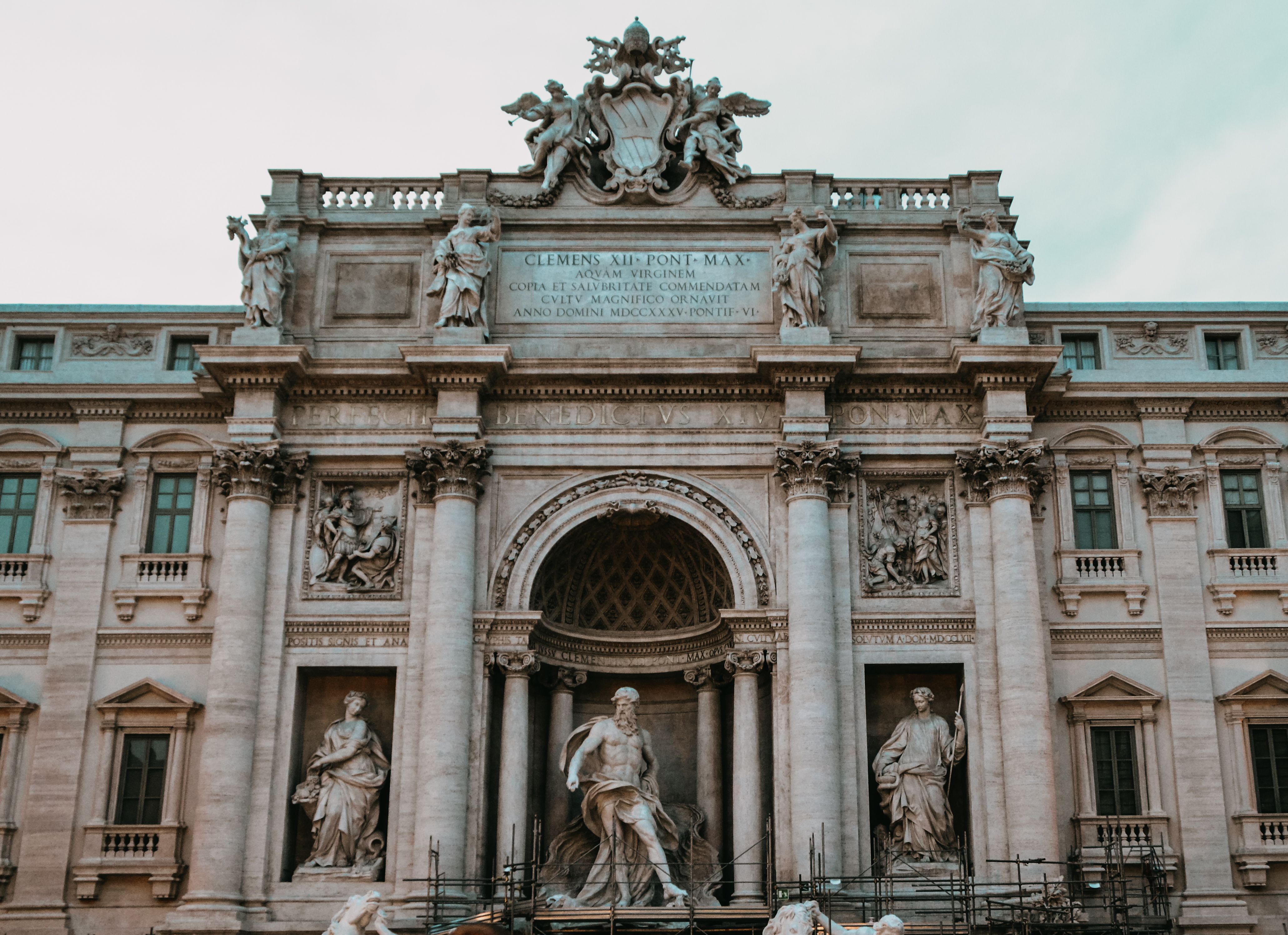 Stunning view of the Trevi Fountain showcasing its intricate Baroque architecture in Rome, Italy.