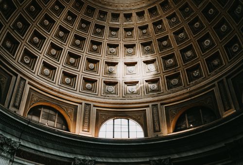 Free Intricate coffered dome design from a historic building in Rome, Italy, showcasing architectural elegance. Stock Photo