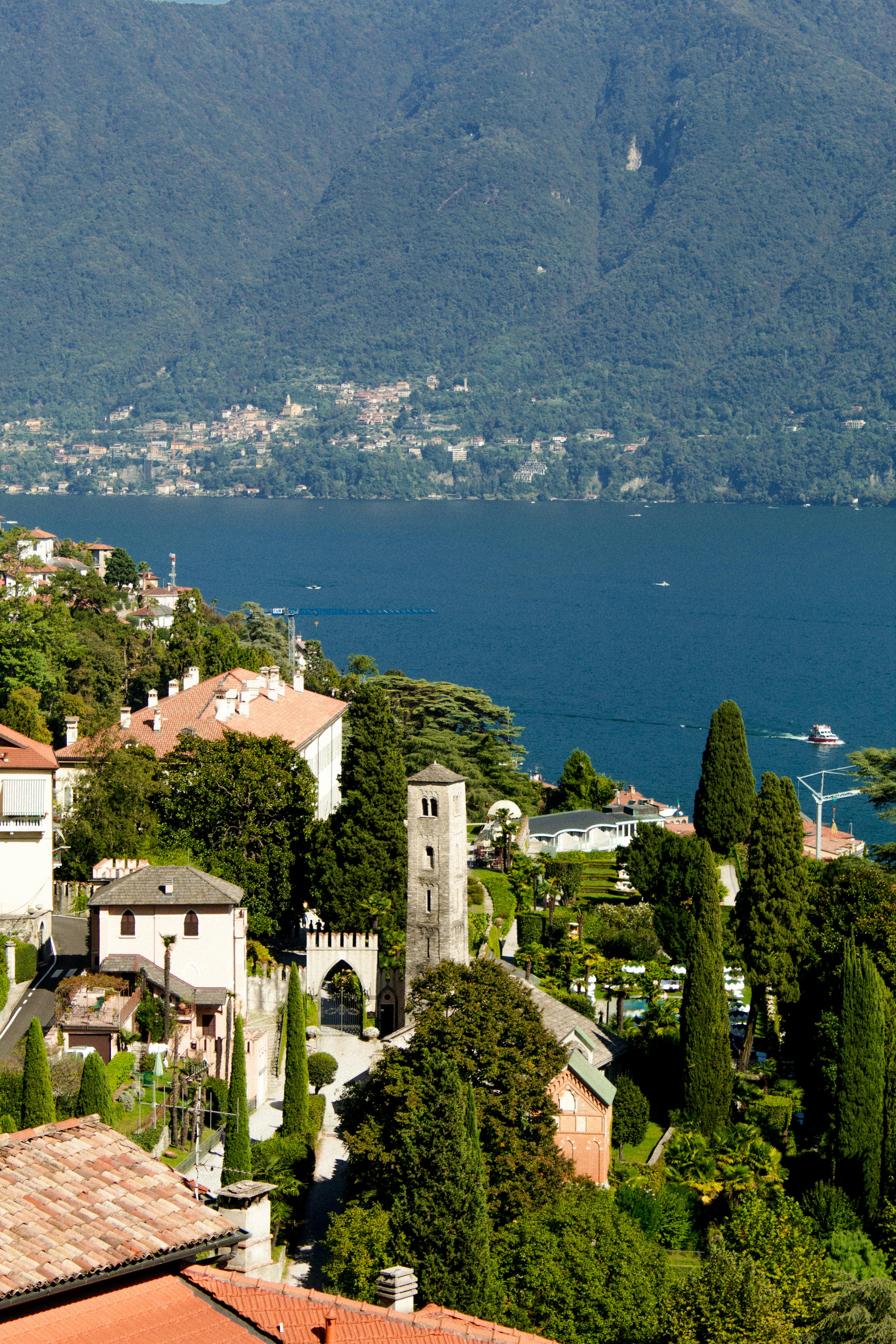 Picturesque landscape of Lake Como in Lombardy, Italy, highlighting the surrounding architecture and natural beauty.