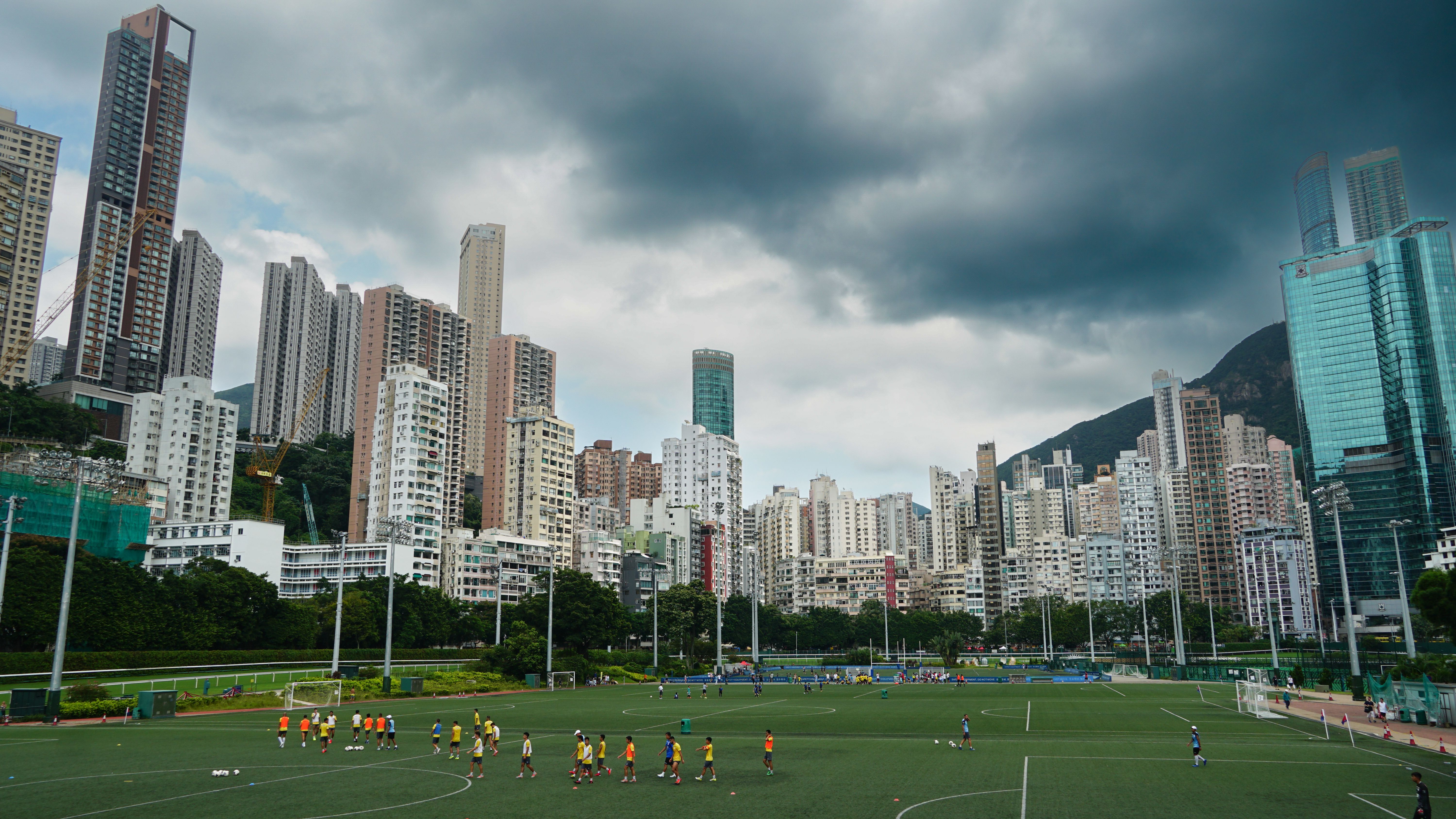 Skyscraper For Back Rounds A Stadium Surrounded by Skyscrapers · Free Stock Photo