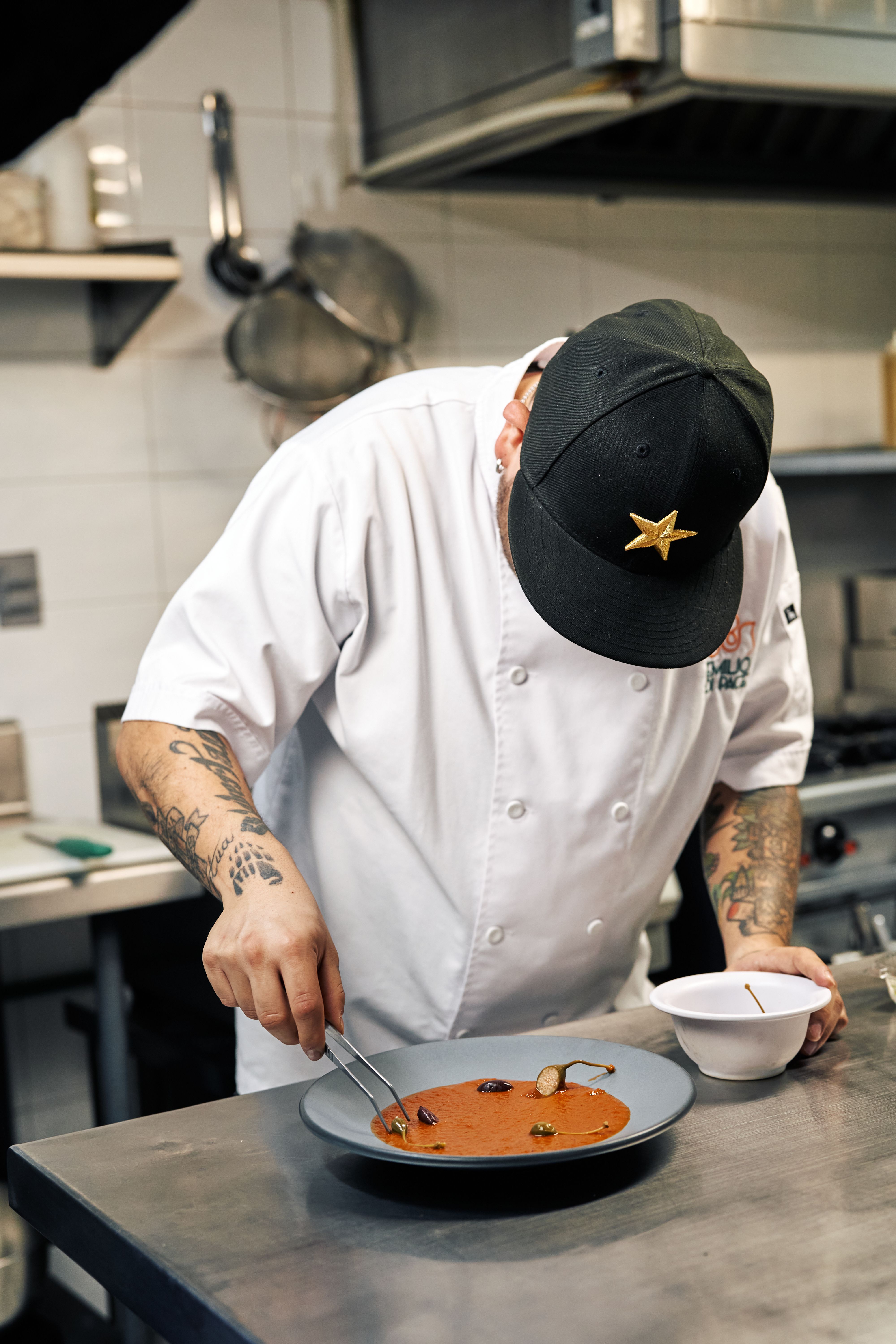 Chef plating a seasonal dish
