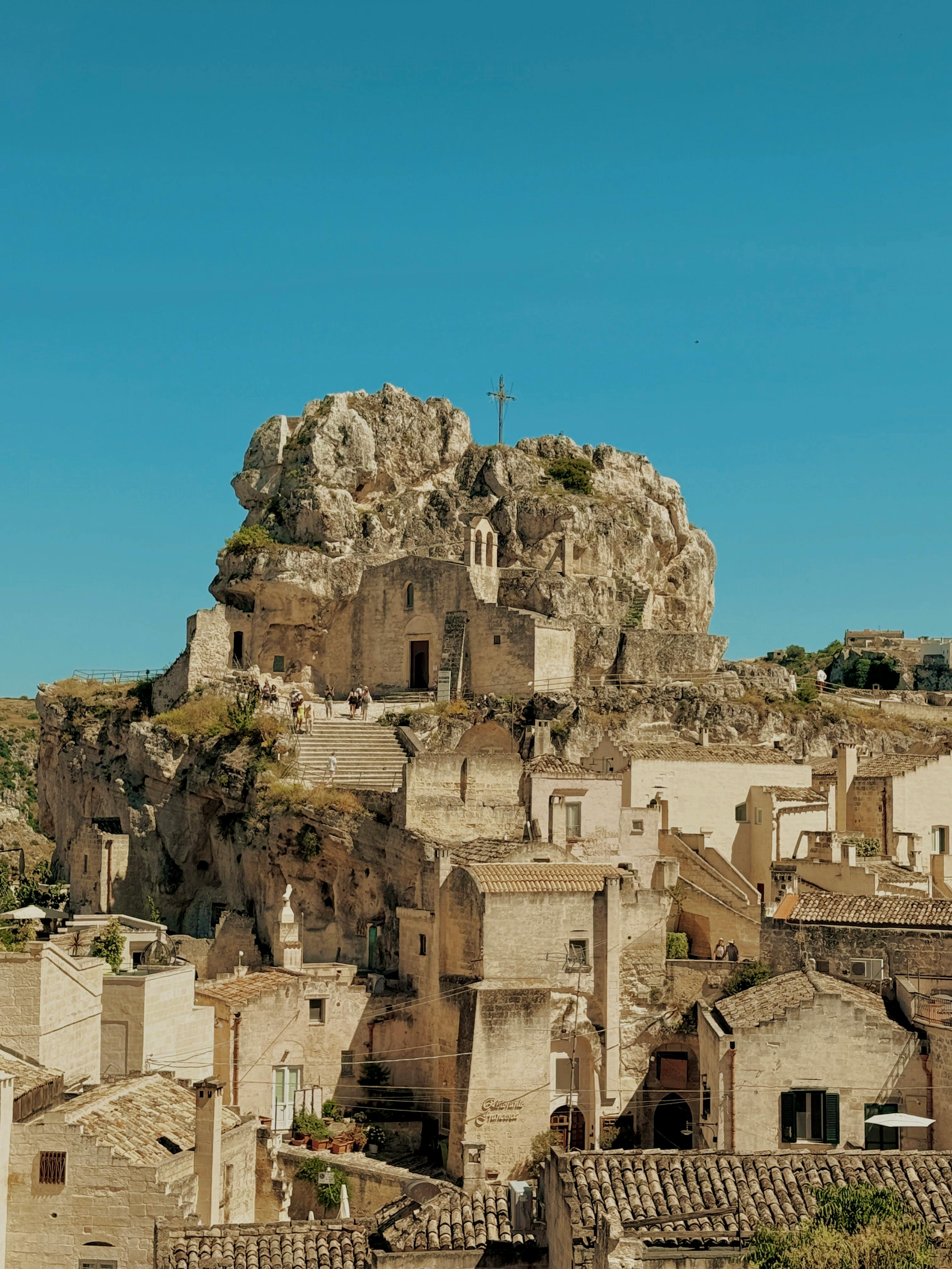Explore the ancient rock dwellings of Matera, Italy, showcasing stunning architecture and history.