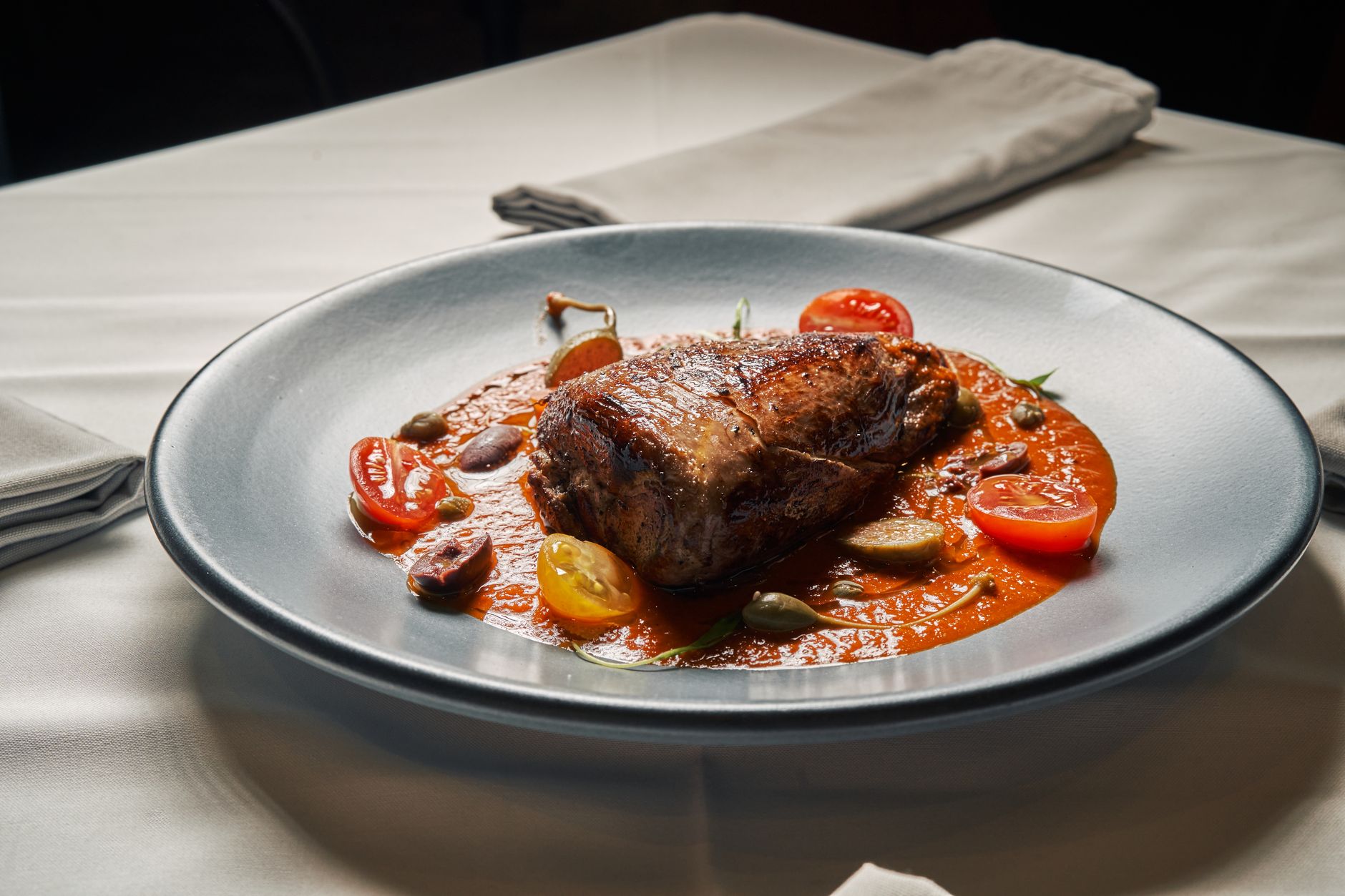 Close-up of Beef Braciole in rich tomato sauce