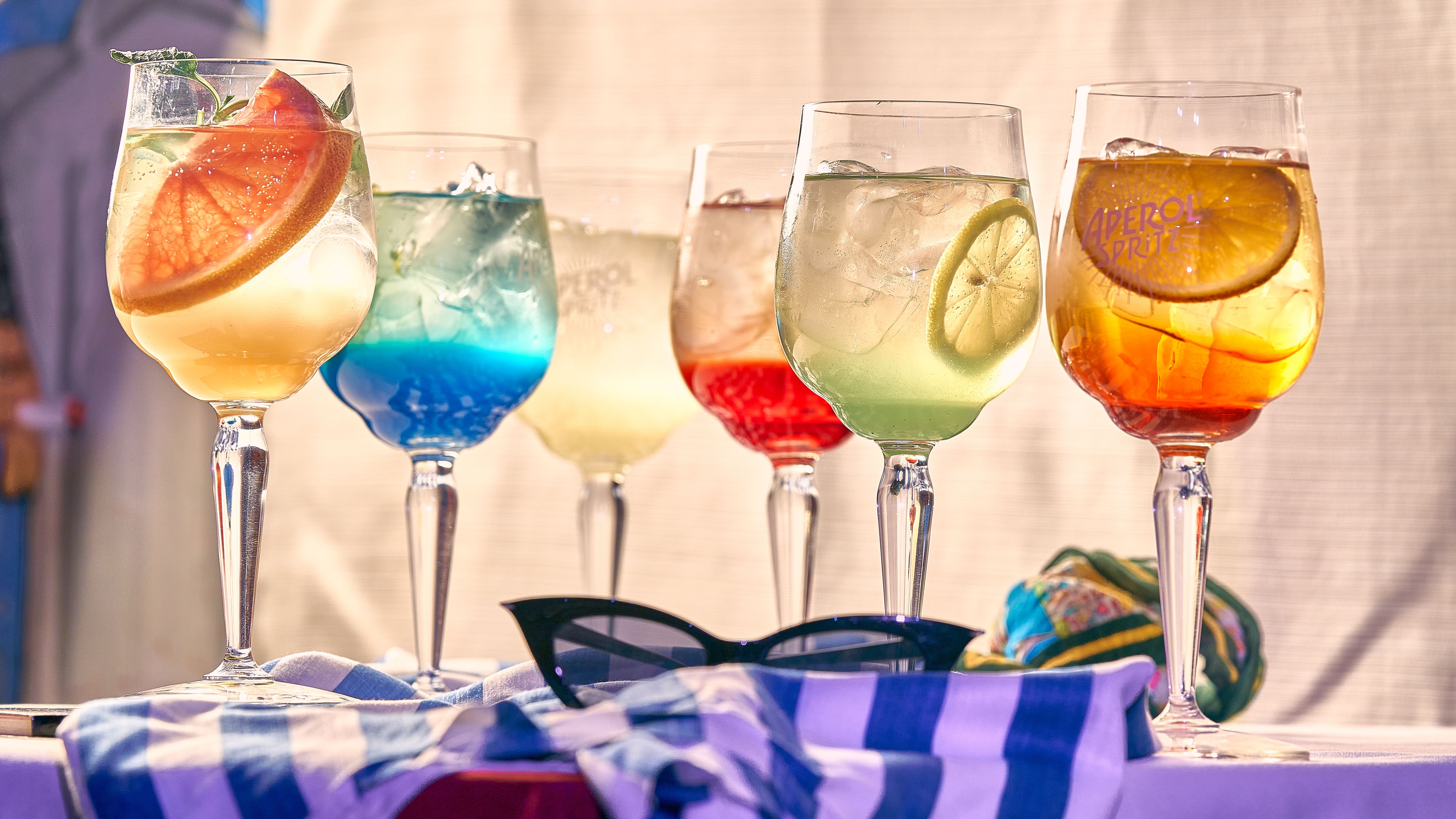 Colorful team cocktail pouches lined up