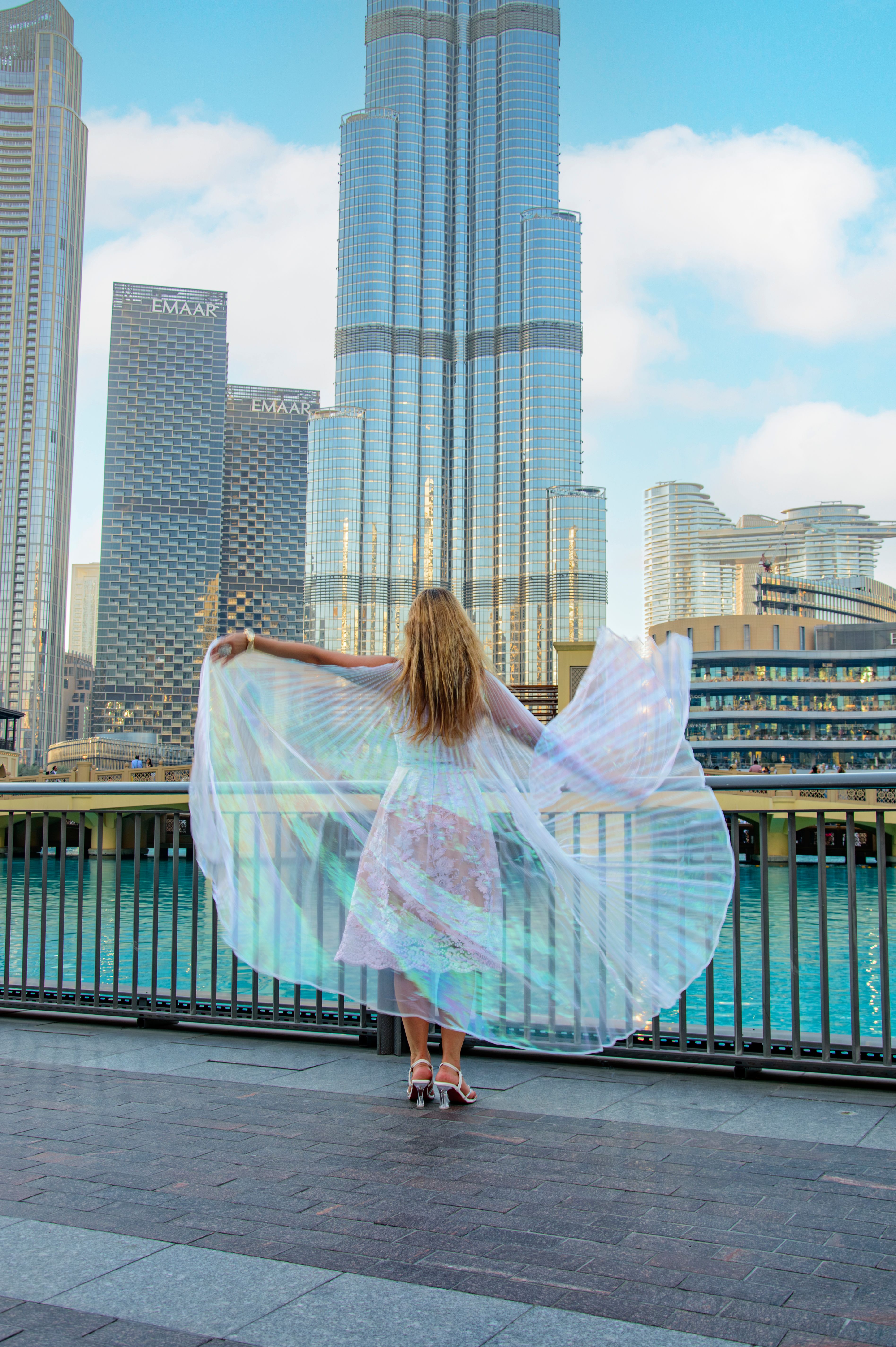 Elegant Woman in Dress by Burj Khalifa, Dubai  Free Stock Photo