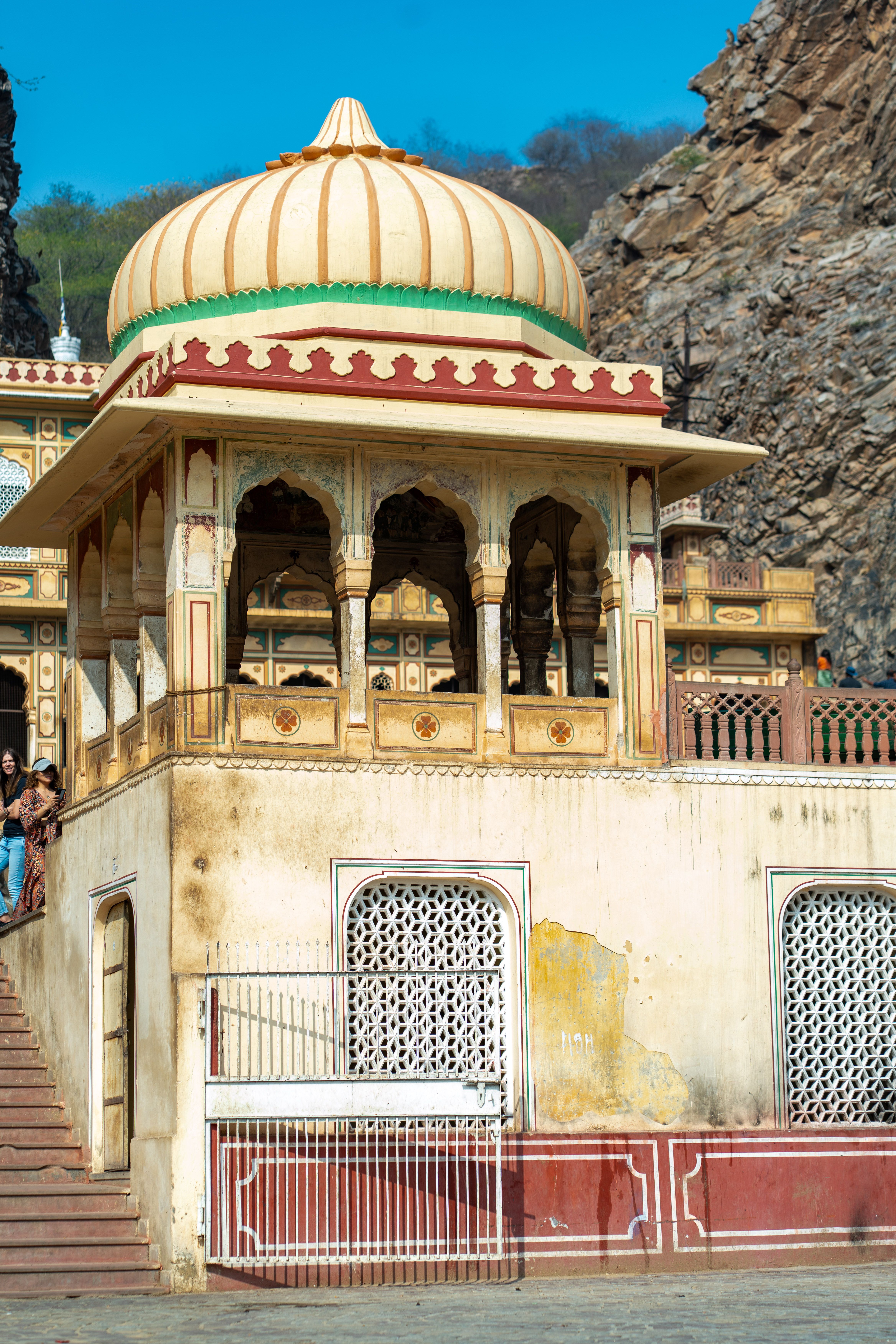 Historic Indian Architecture with Monk in Orange Robe · Free Stock Photo
