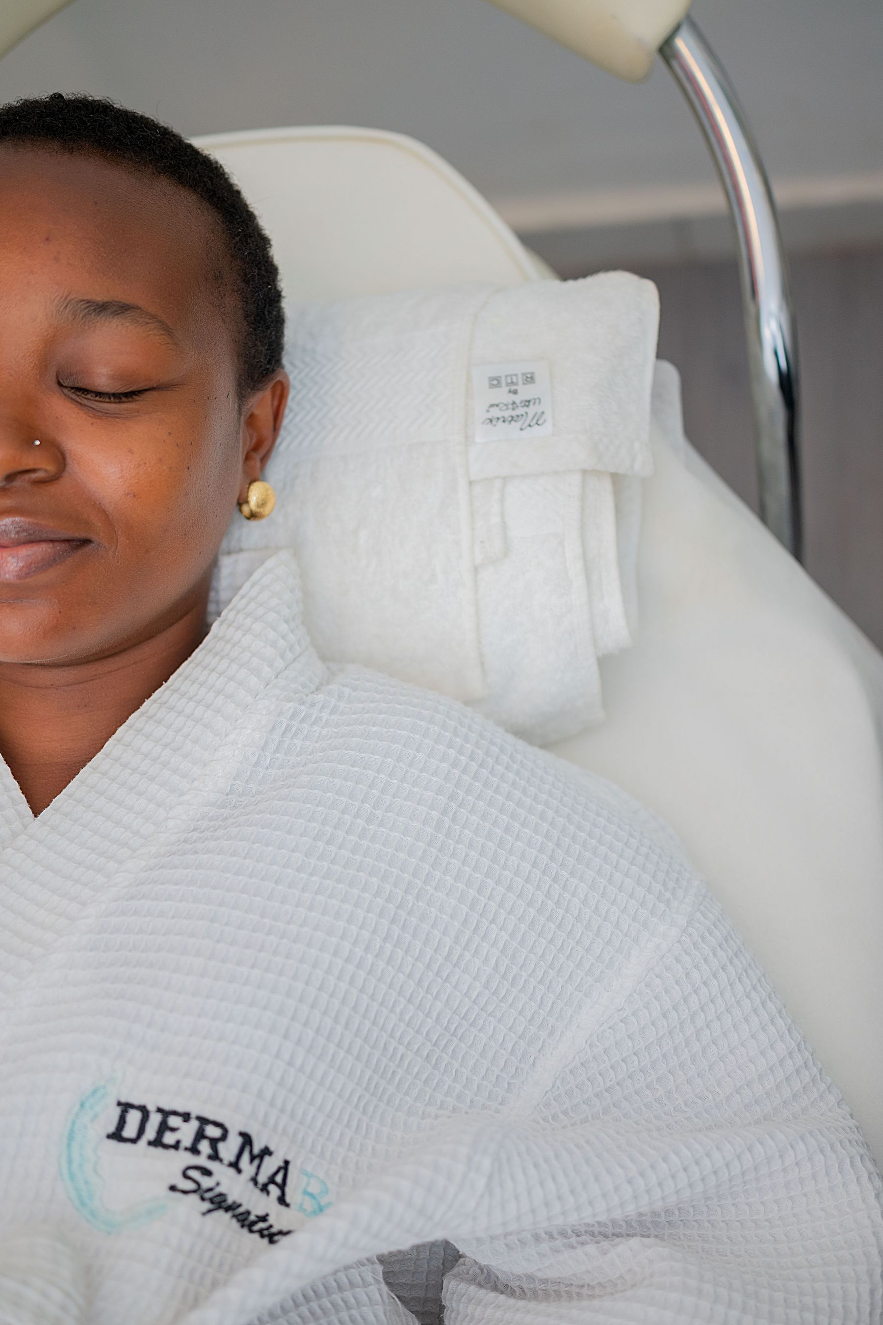 African woman enjoying a relaxing spa experience