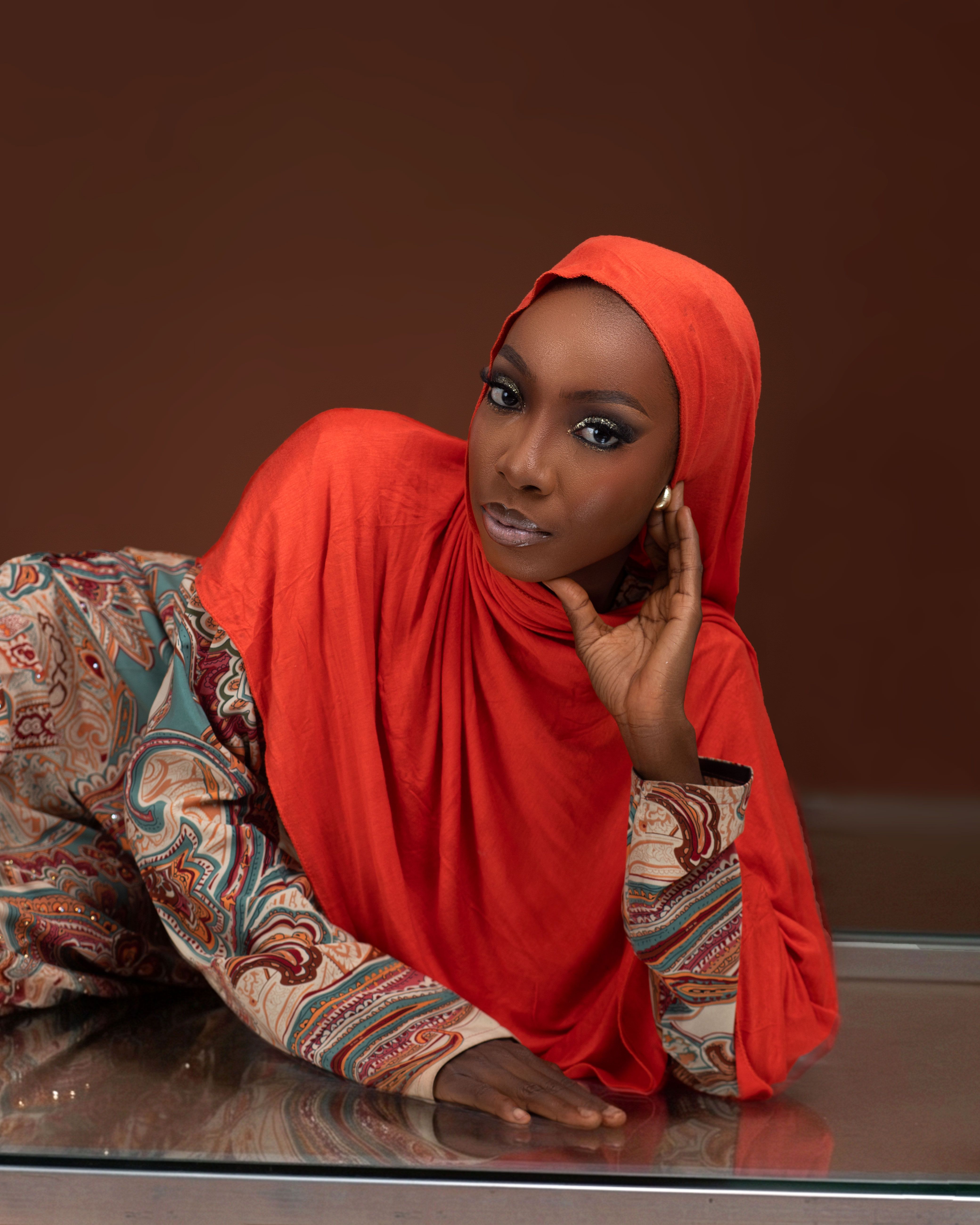 Elegant Portrait of Woman in Red Hijab · Free Stock Photo