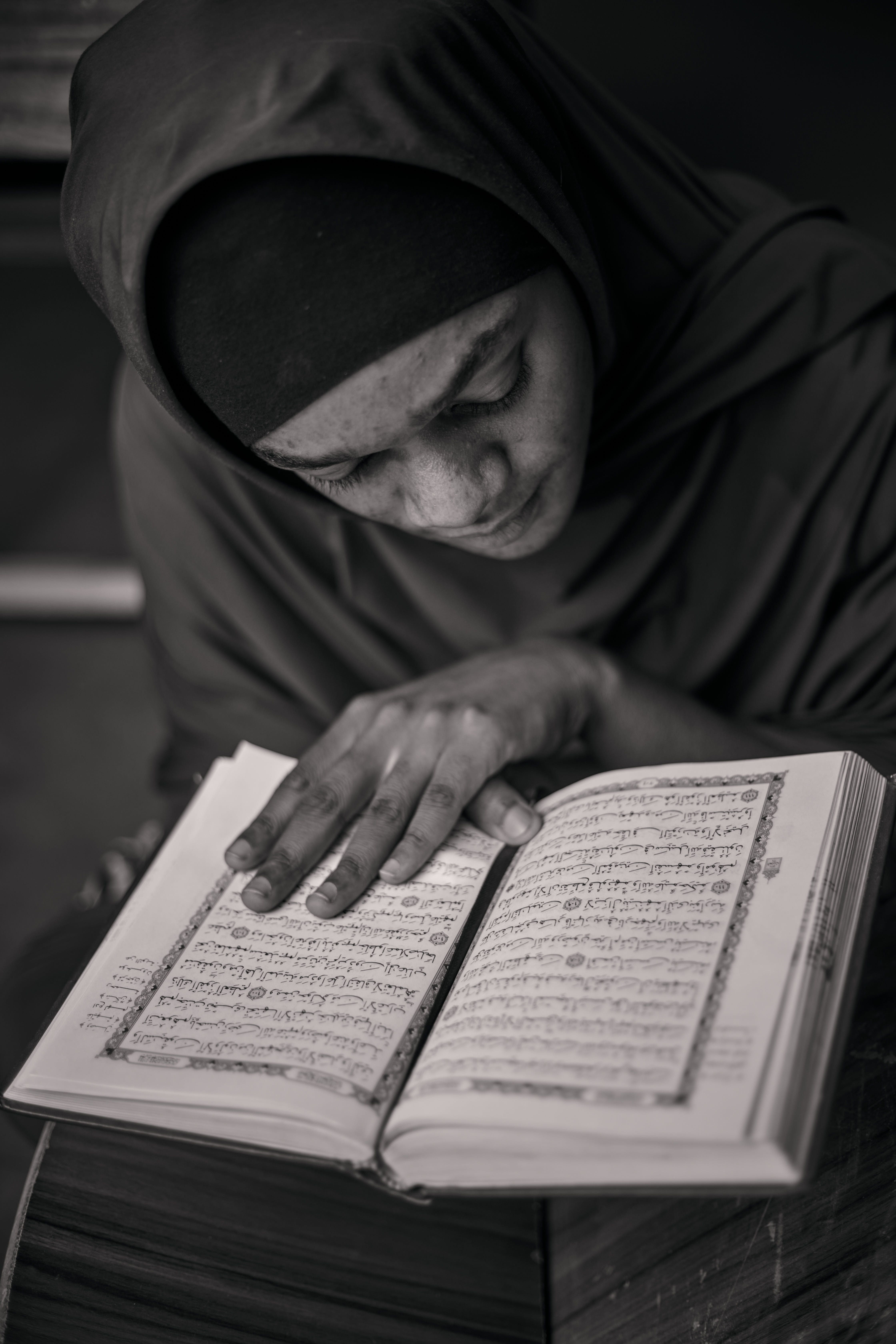 Young Woman Reading Religious Text in Nigeria · Free Stock Photo