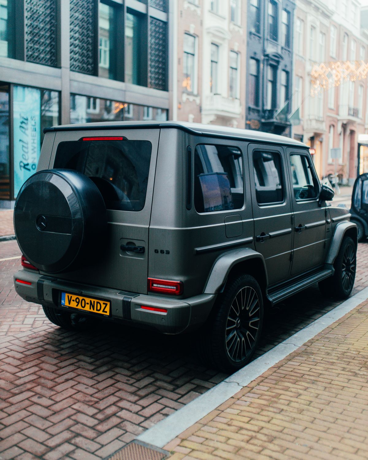Mercedes-Benz G-Class Parked on the Side of a Street in a City · Free ...