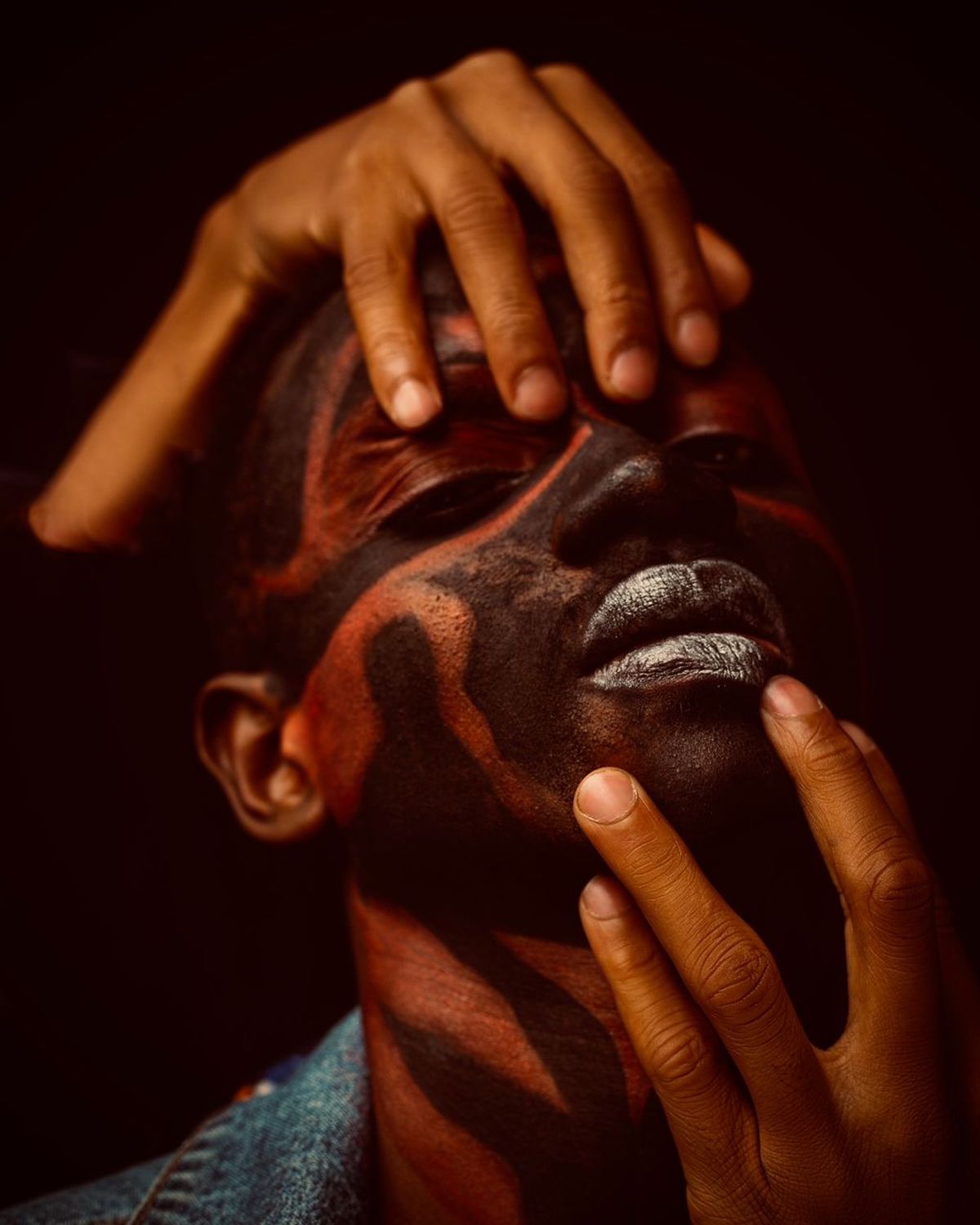 Portrait of a Man with Face Paint · Free Stock Photo