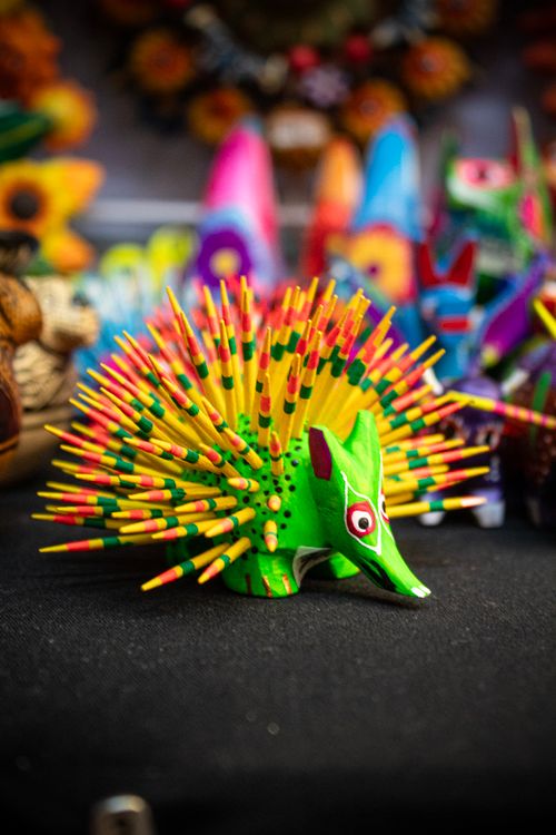 Free Colorful handmade Mexican alebrije porcupine sculpture in Coyoacán market, capturing traditional art and craft. Stock Photo