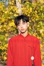 Young Man in Red with Yellow Blossoms