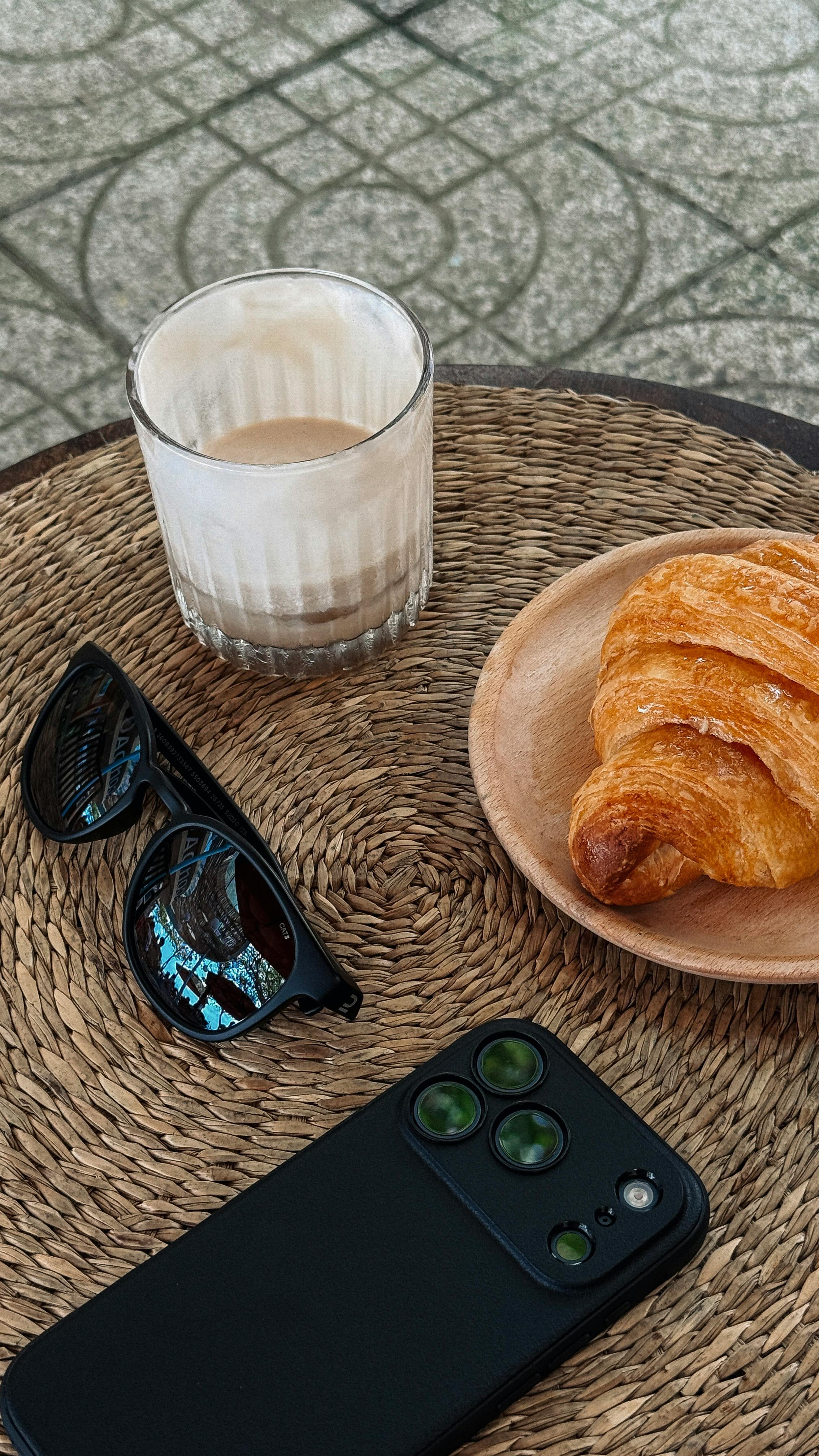 Cozy Outdoor Breakfast with Coffee and Croissant