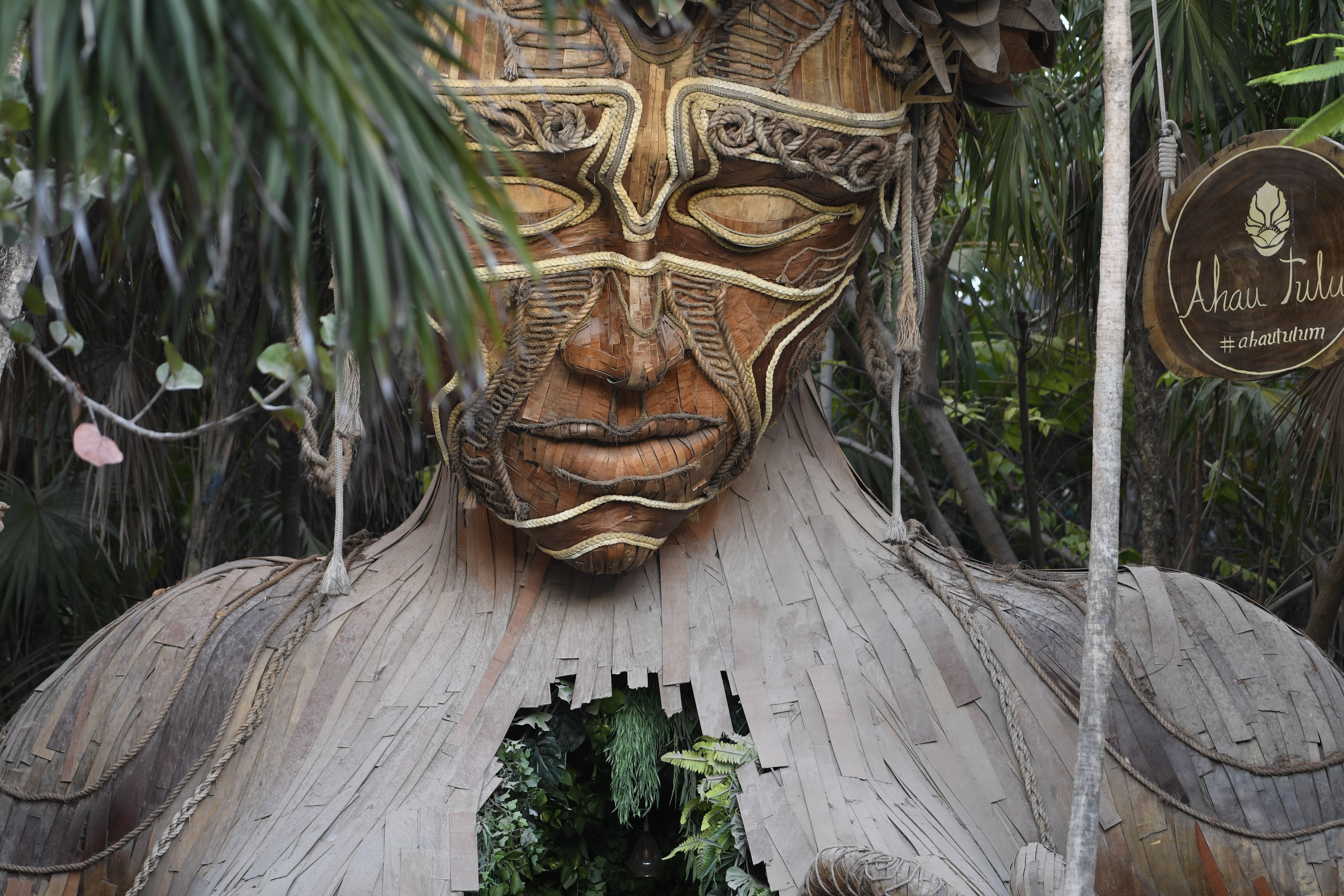 Traditional Wooden Sculpture of Face with Tongue Sticking Out · Free ...