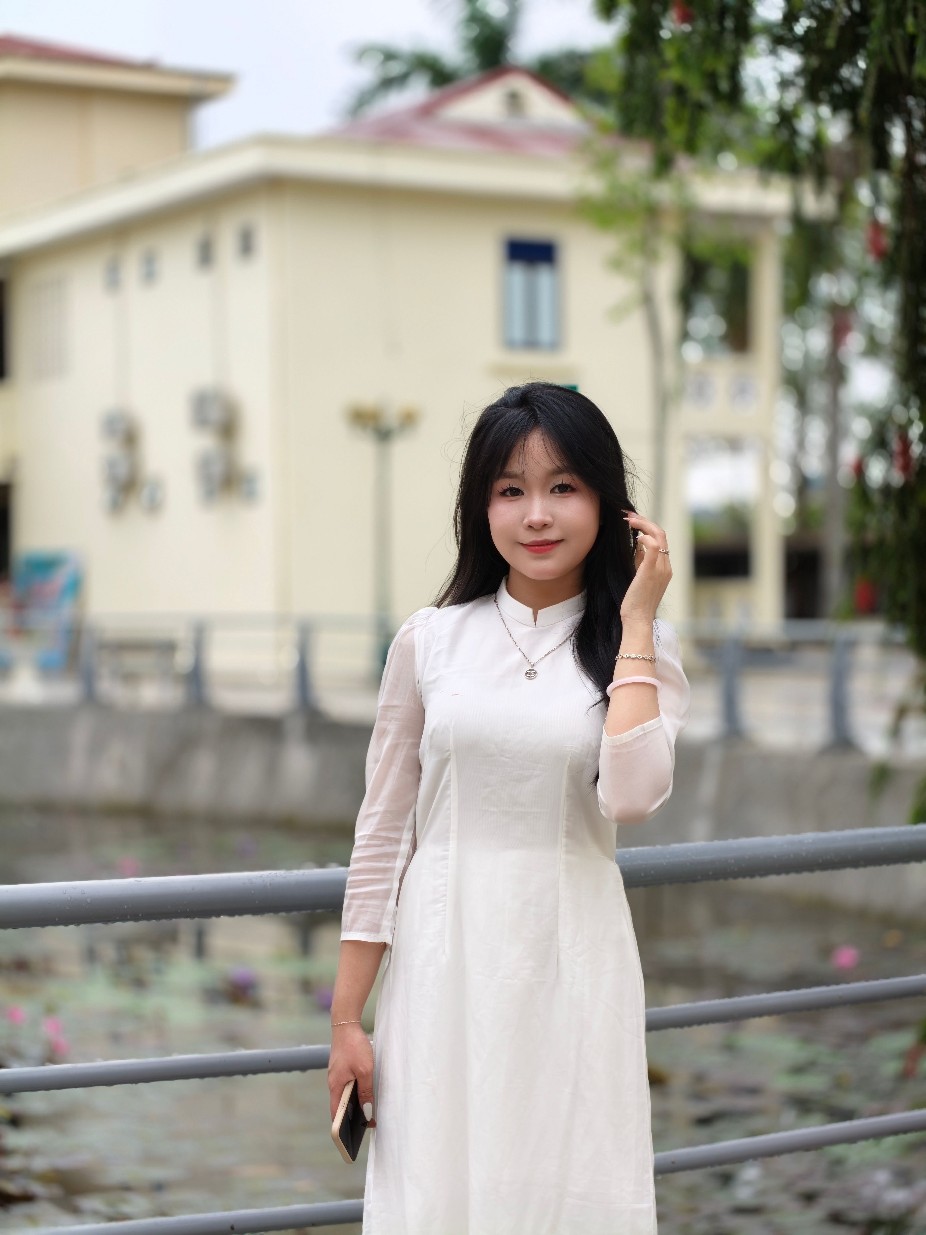 Young Woman in White Dress Outdoors