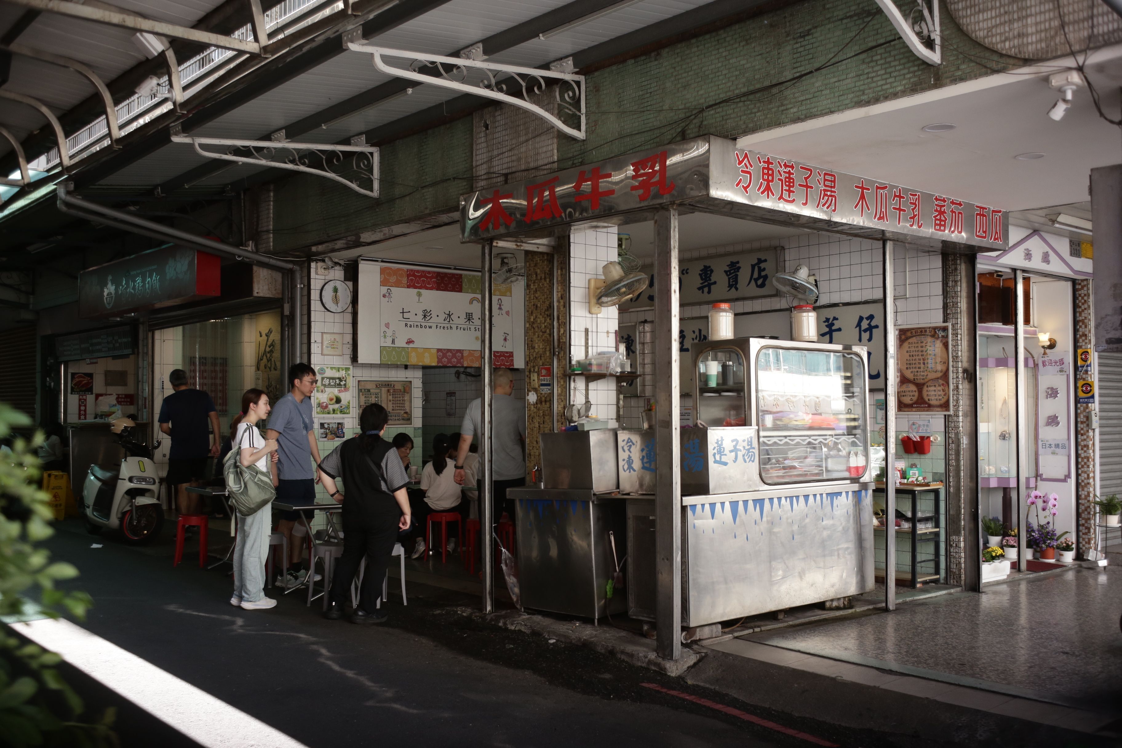 Street Food Stall in Urban Asian Setting · Free Stock Photo