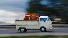 Vintage Van Moving Furniture on Highway