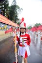 Girl in Red Band Uniform Leading Parade