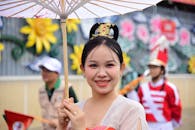 Young Woman in Traditional Parade Costume Smiling