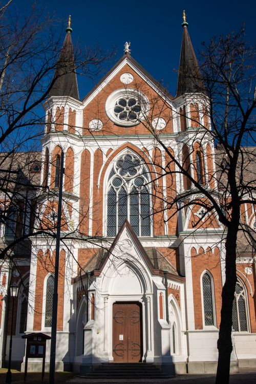 Free A beautiful church facade in Jönköping, Sweden, illuminated by sunlight. Stock Photo