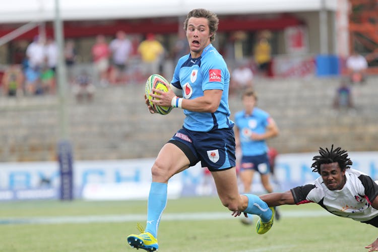 Men Playing Rugby