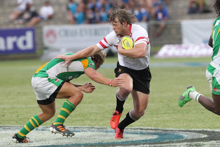 Group Of Men Playing Rugby