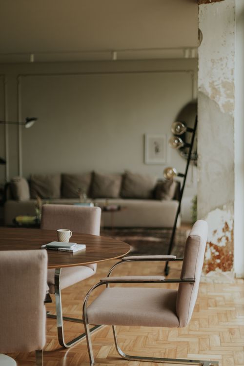 Free Elegant and cozy living room interior with modern furniture and soft lighting. Stock Photo