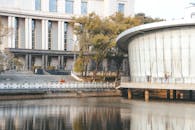 Urban Architecture with Modern Buildings by a Calm River