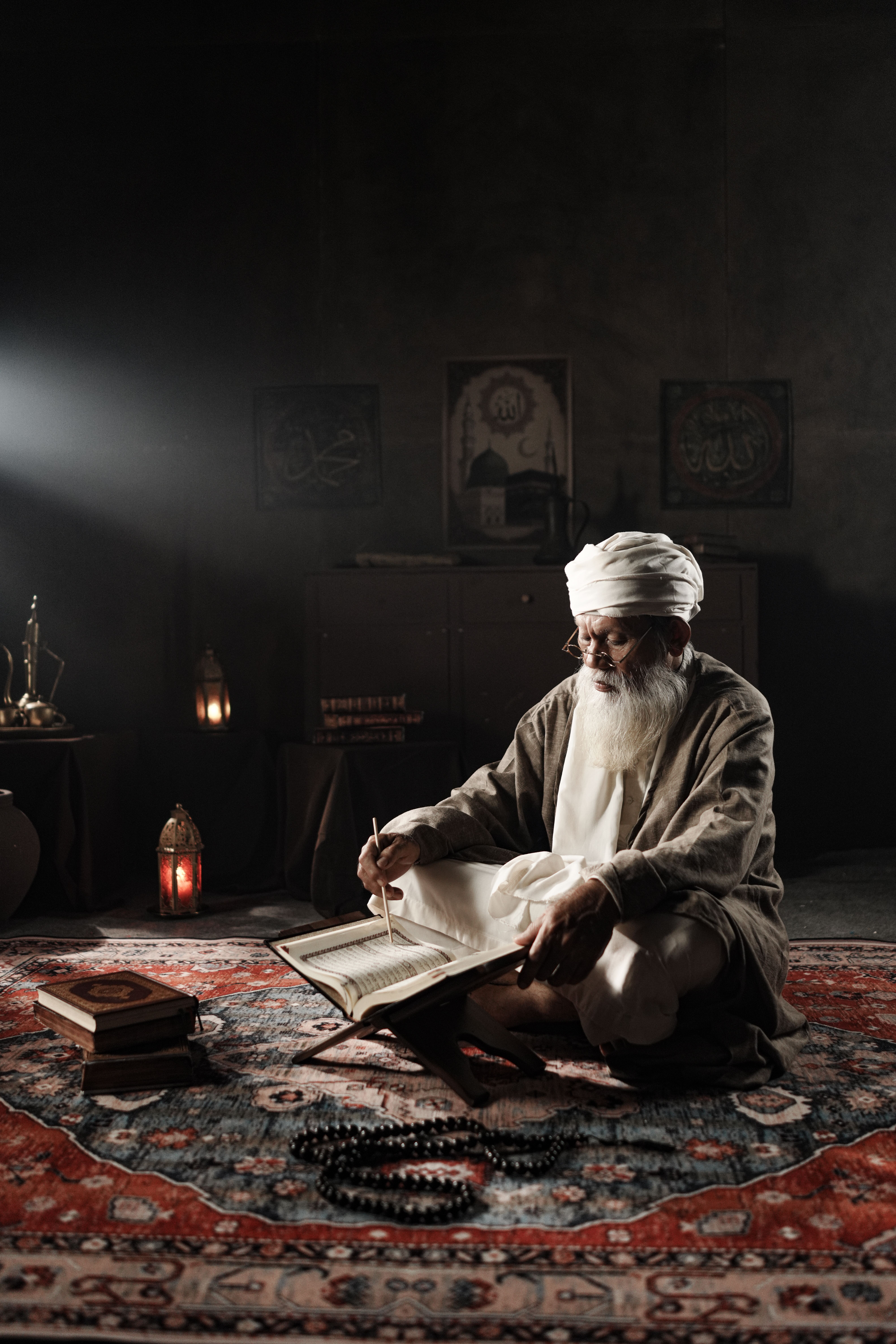 Elderly Man Reading Religious Scripture Indoors · Free Stock Photo