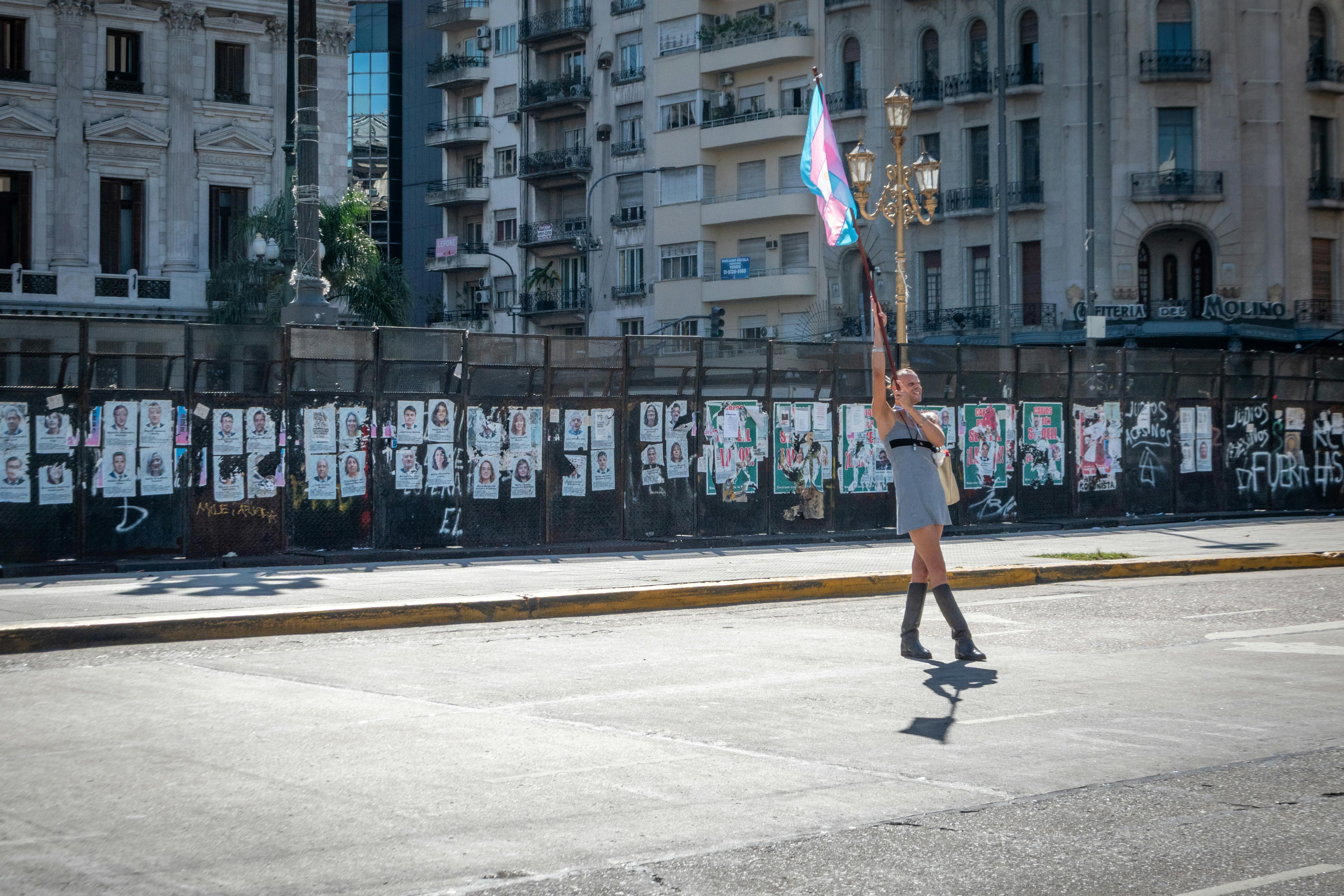 A person waves a flag during a protest in Buenos Aires, Argentina.