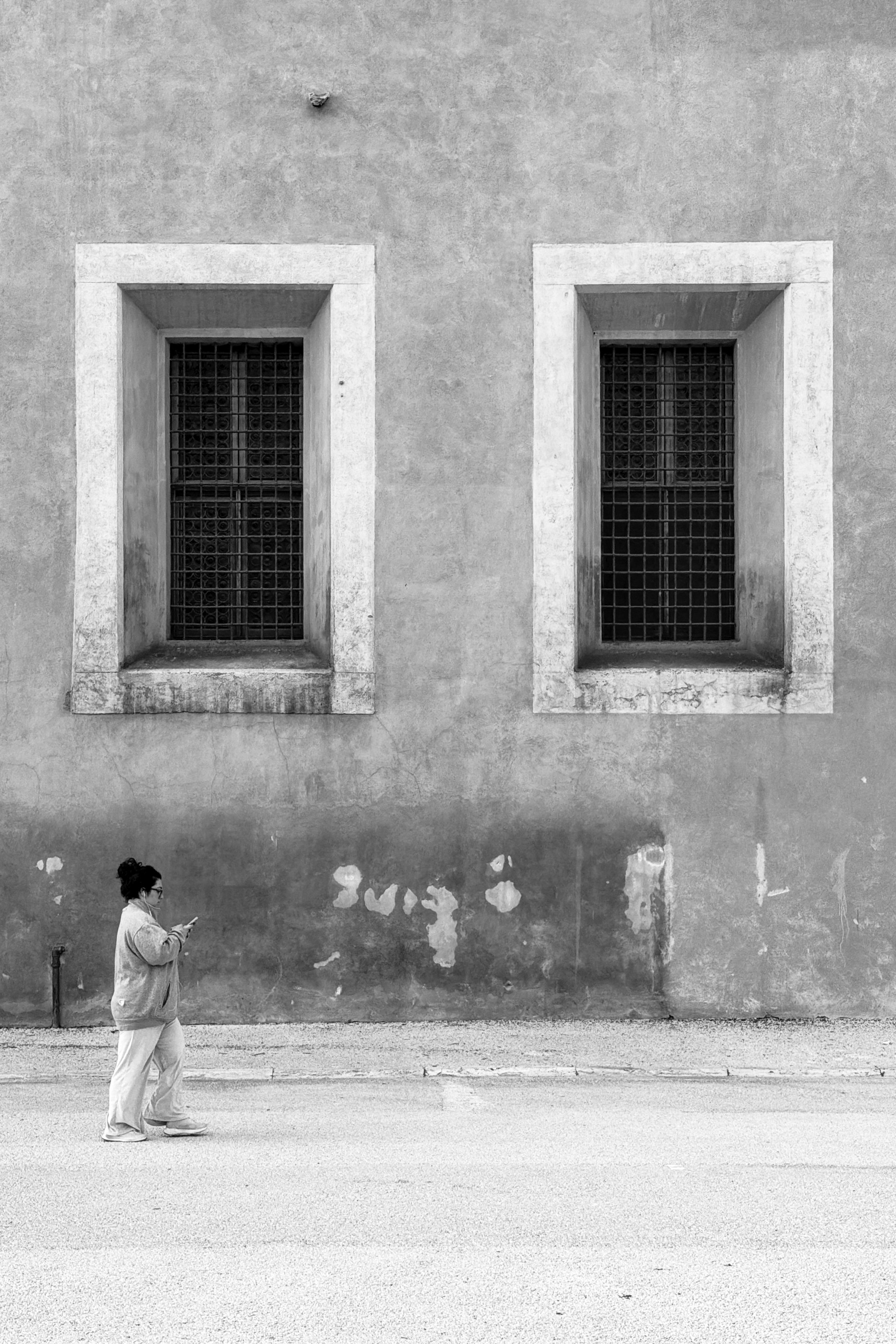 Black and White Street Photography with Walking Woman · Free Stock Photo