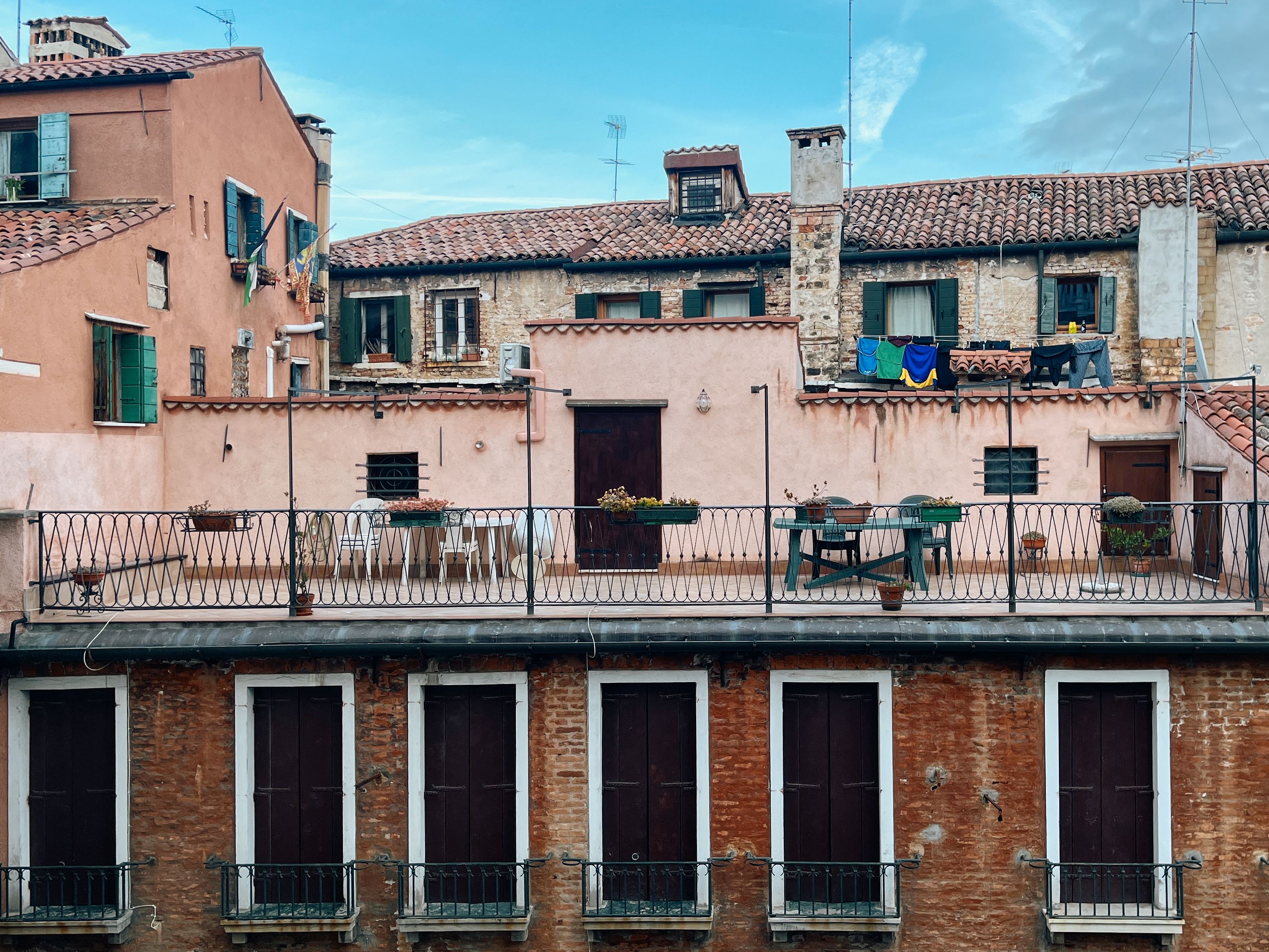 Aerial View of Charming European Rooftop Terrace · Free Stock Photo