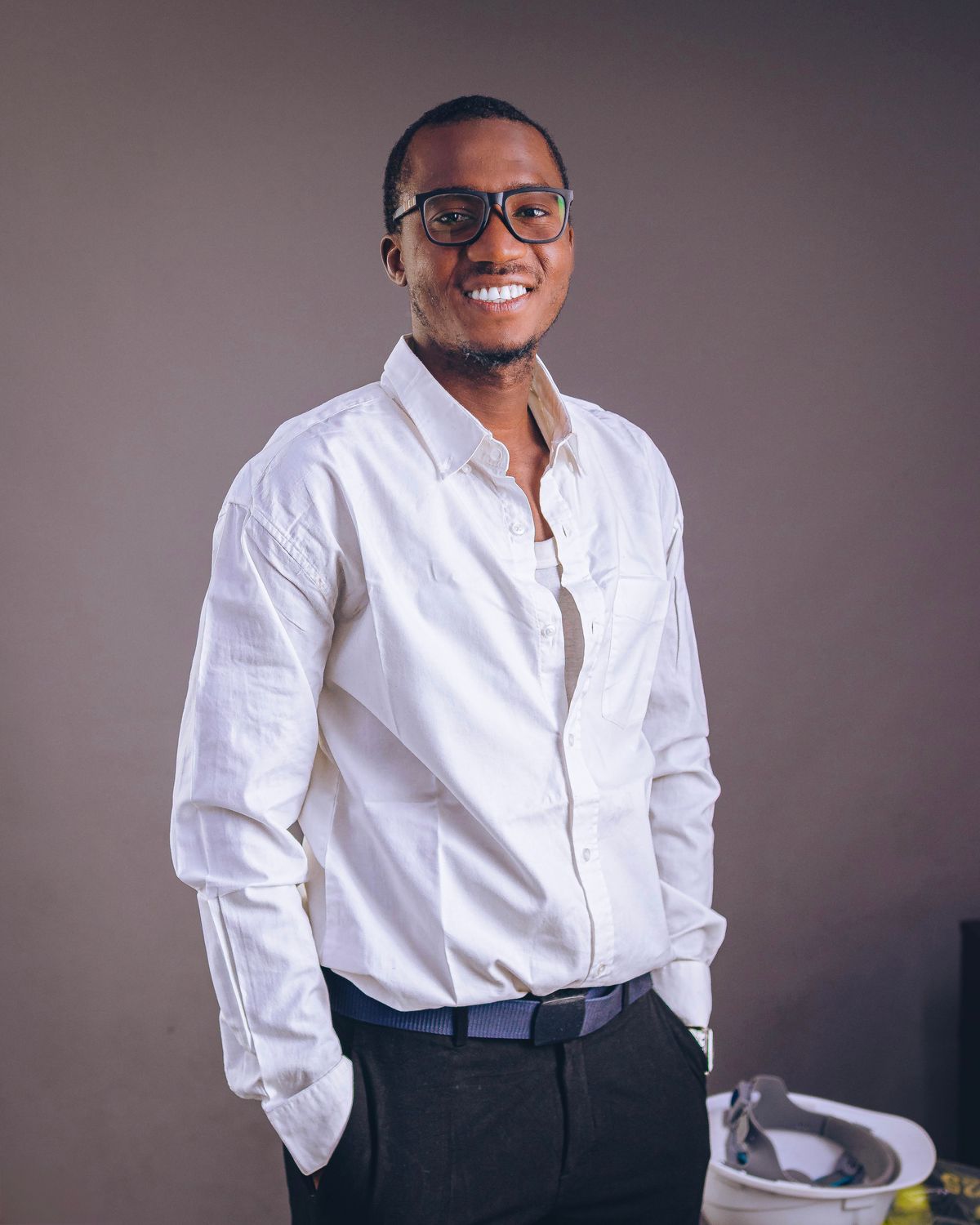 Smiling African Man in Casual White Shirt · Free Stock Photo