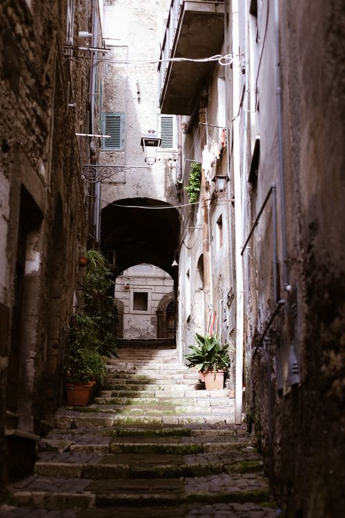 Free Explore the rustic charm of a historic stone alley in Anagni, Lazio, Italy. Stock Photo