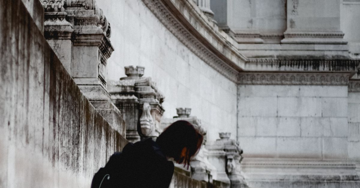 Contemplation Steps Contemplative Moment on Historic Stone Steps · Free Stock Photo