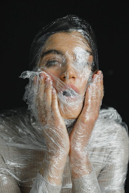 Free Woman Wrapped In Plastic Stock Photo