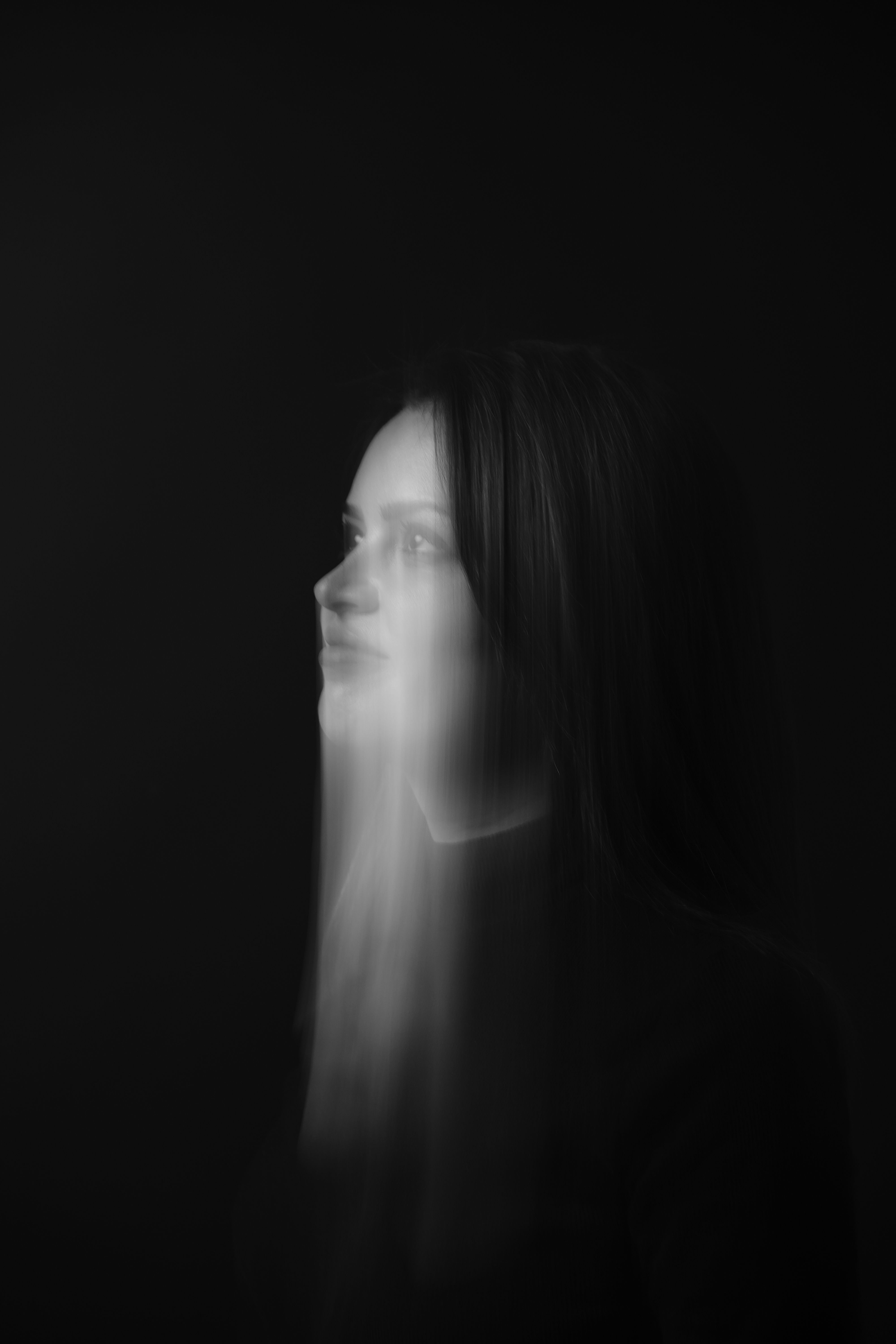 Moody Black and White Portrait with Motion Blur · Free Stock Photo