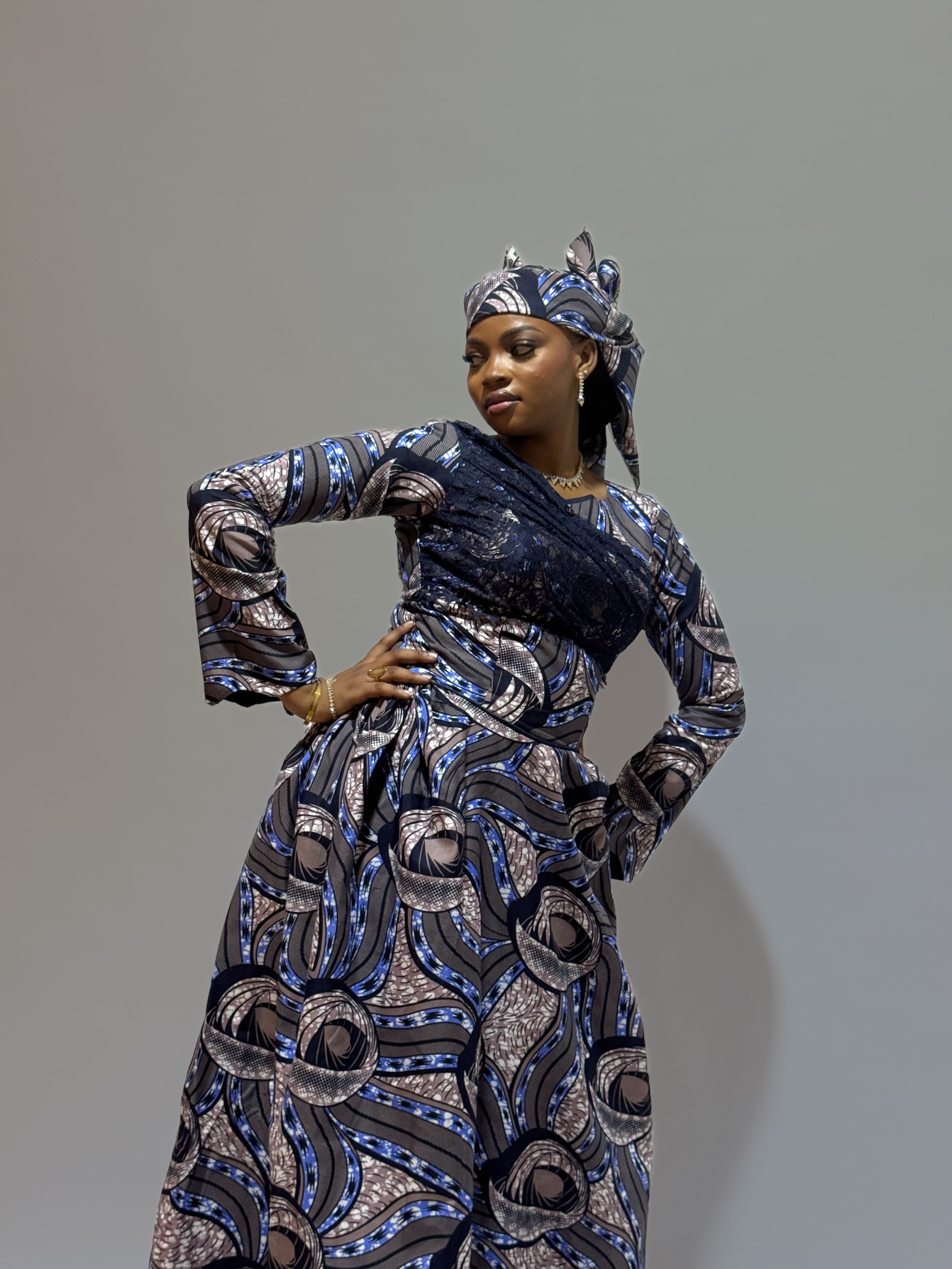Elegant Woman in Traditional African Dress · Free Stock Photo