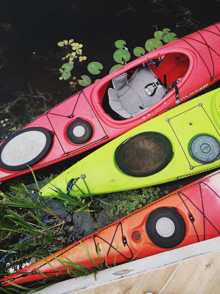 Red, Green And Orange Kayaks