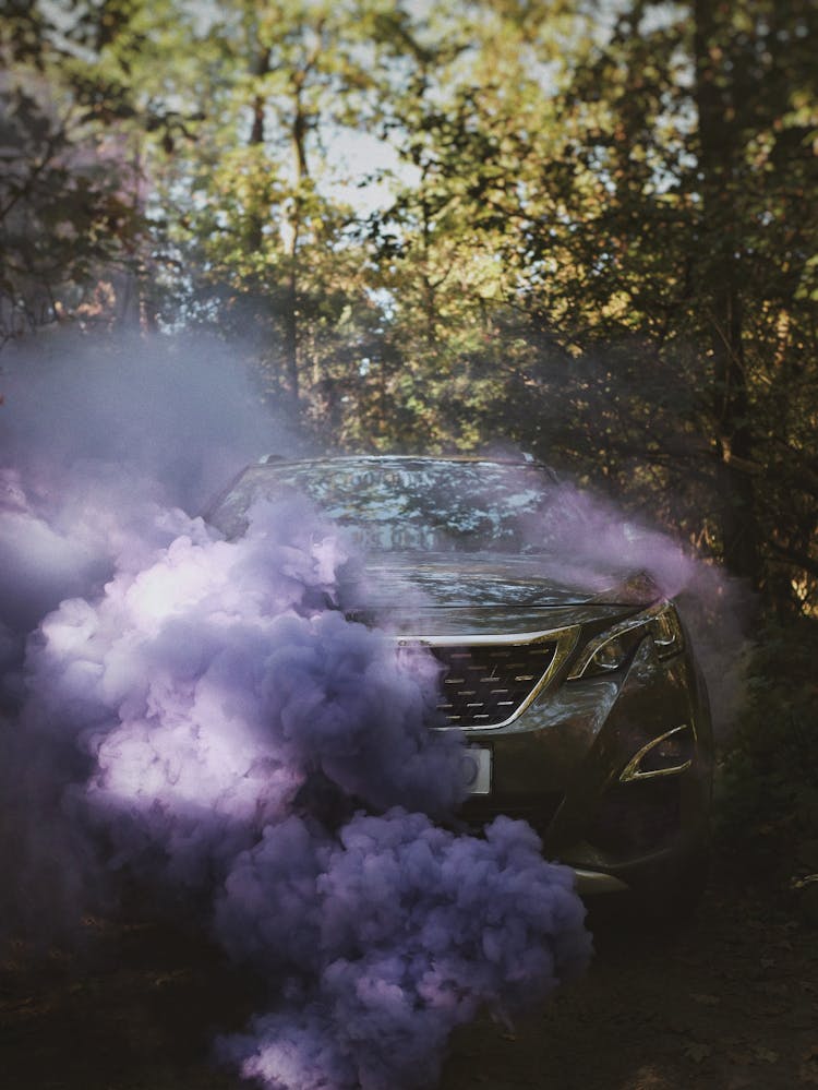 Purple Smoke Coming Out From Car