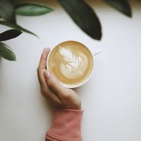 Latte with leaf art, photo by Olena Bohovyk on Pexels