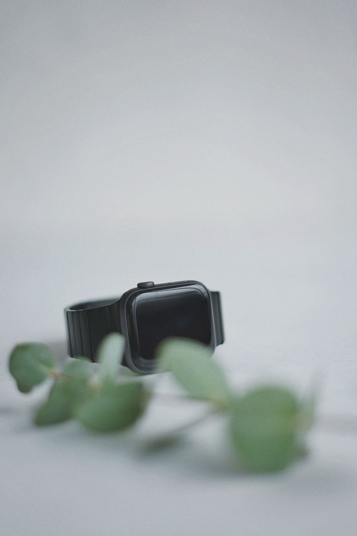 Nexcom Pulse Watch — black smart lifestyle watch on a minimal light surface