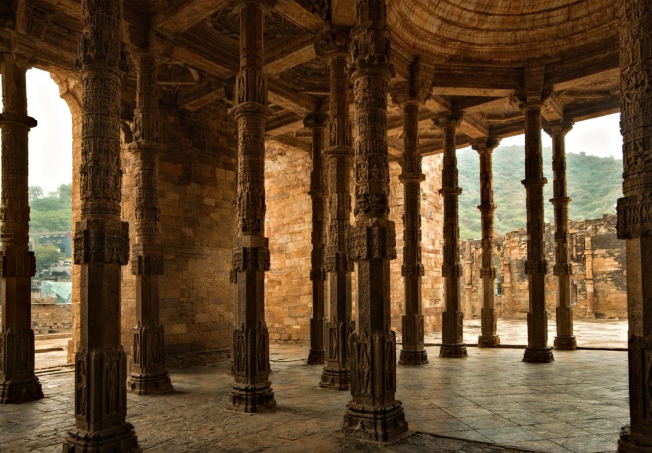beautifully detailed stone pillars in ajmer showcasing islamic archite