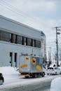 Winter Street Scene with Delivery Truck in Sapporo