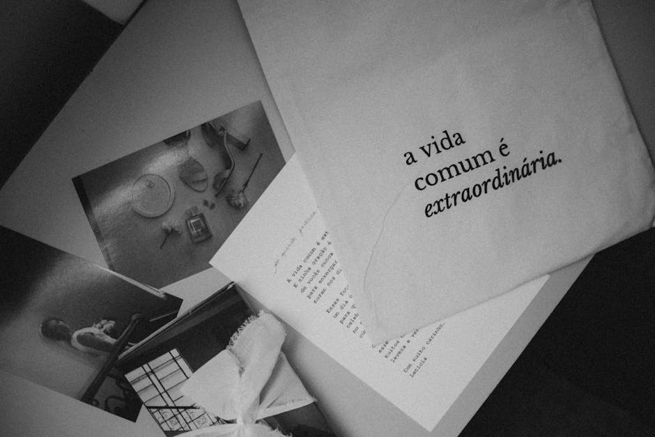 Como Criar um Estilo de Vida Mais Empoderado e Autêntico 2 Monochrome still life featuring Portuguese text 'a vida comum é extraordinária' on paper.