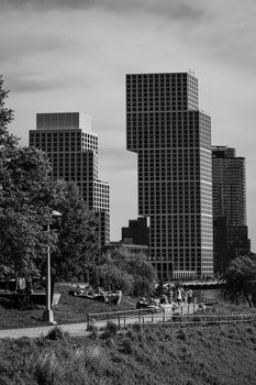 Black and white photo of New York City's contemporary skyscrapers with park view.