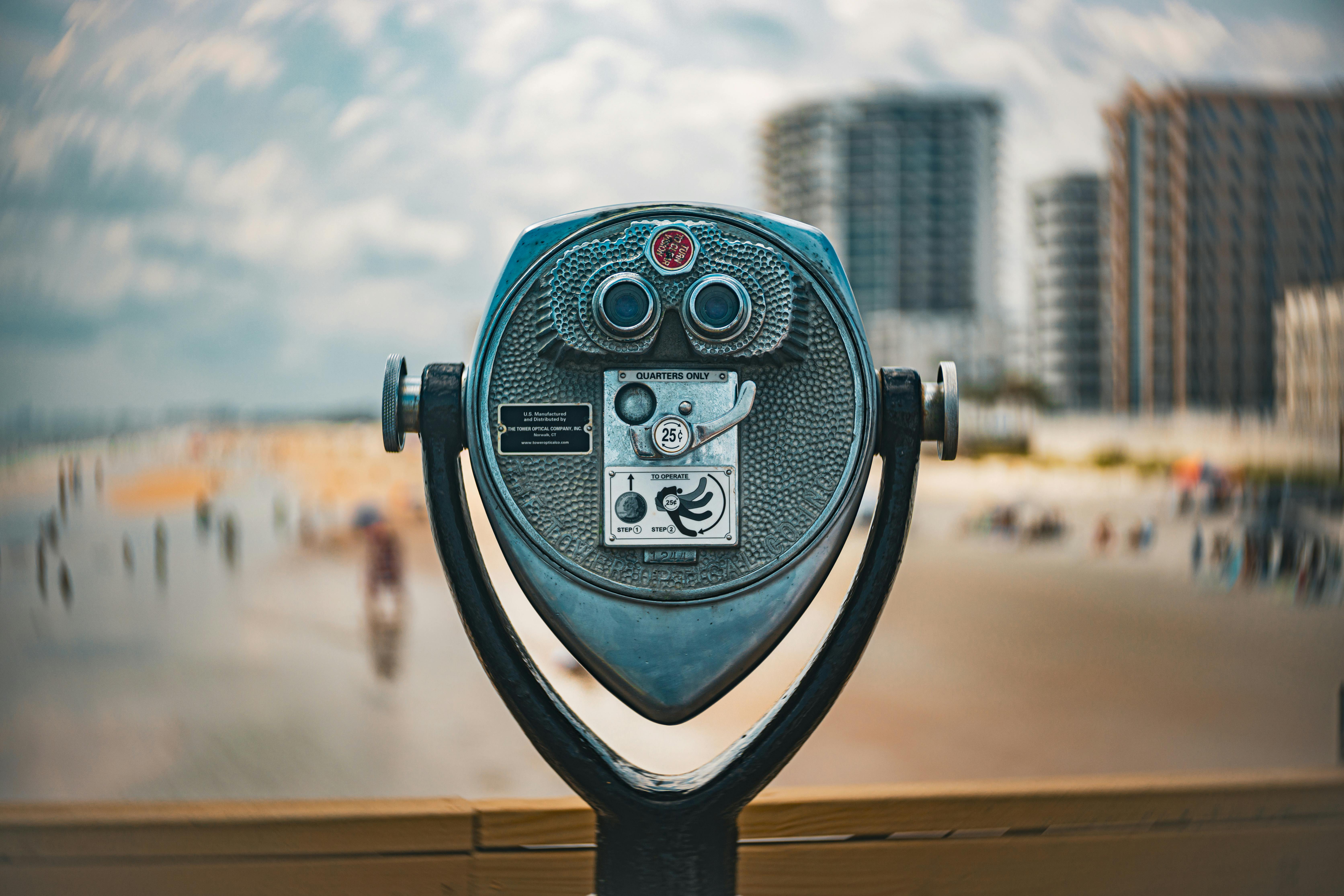 Coin-operated viewer overlooking the sandy beaches and skyline of Daytona Beach, Florida